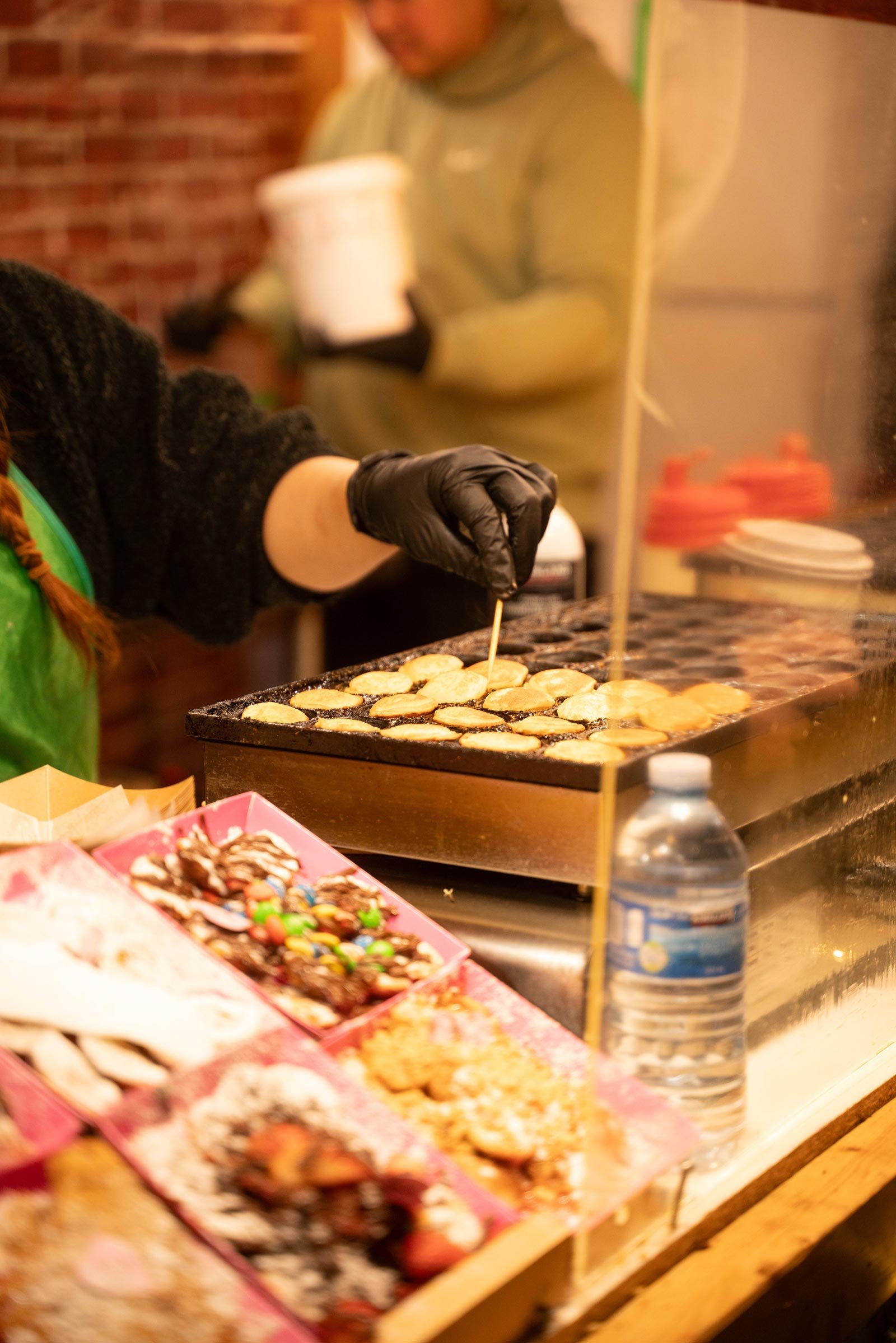 A food vendor serving holiday foods