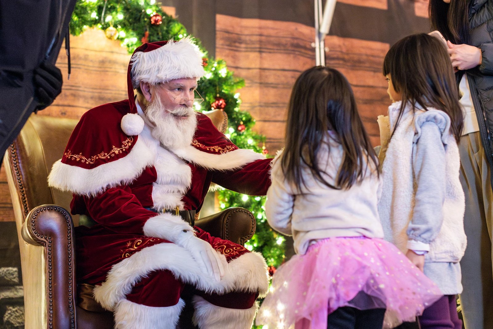 Children meeting Santa at his workshop at the Vancouver Christmas Market